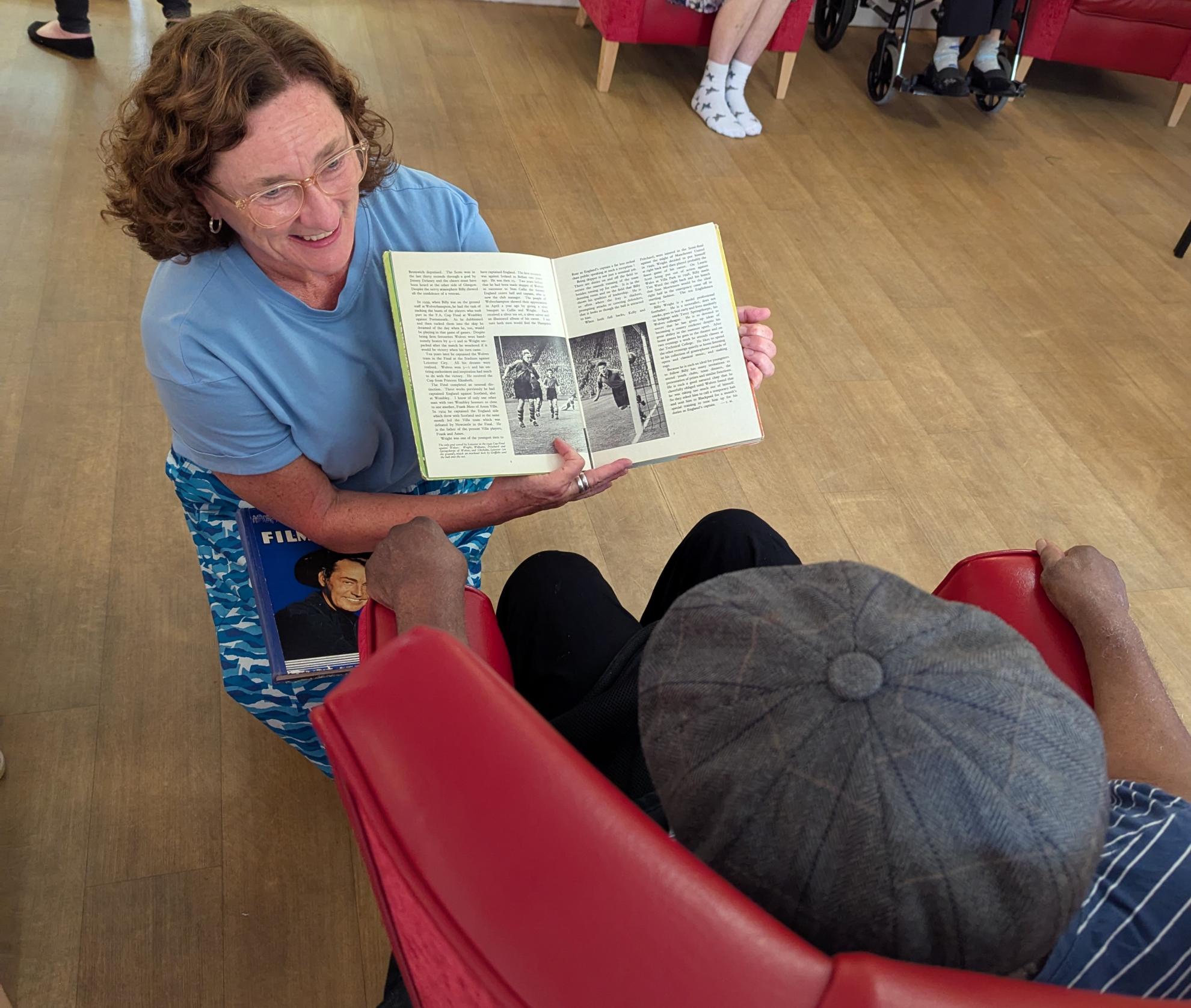 Bryony showing Norris vintage football books