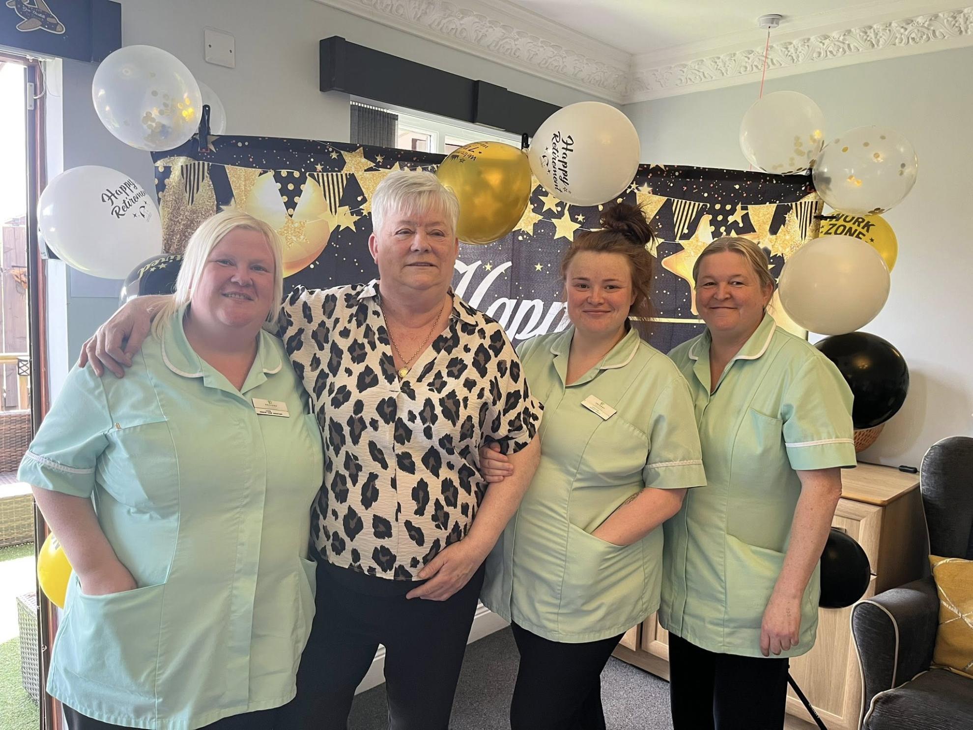 Group photo of some of the care team with Heather