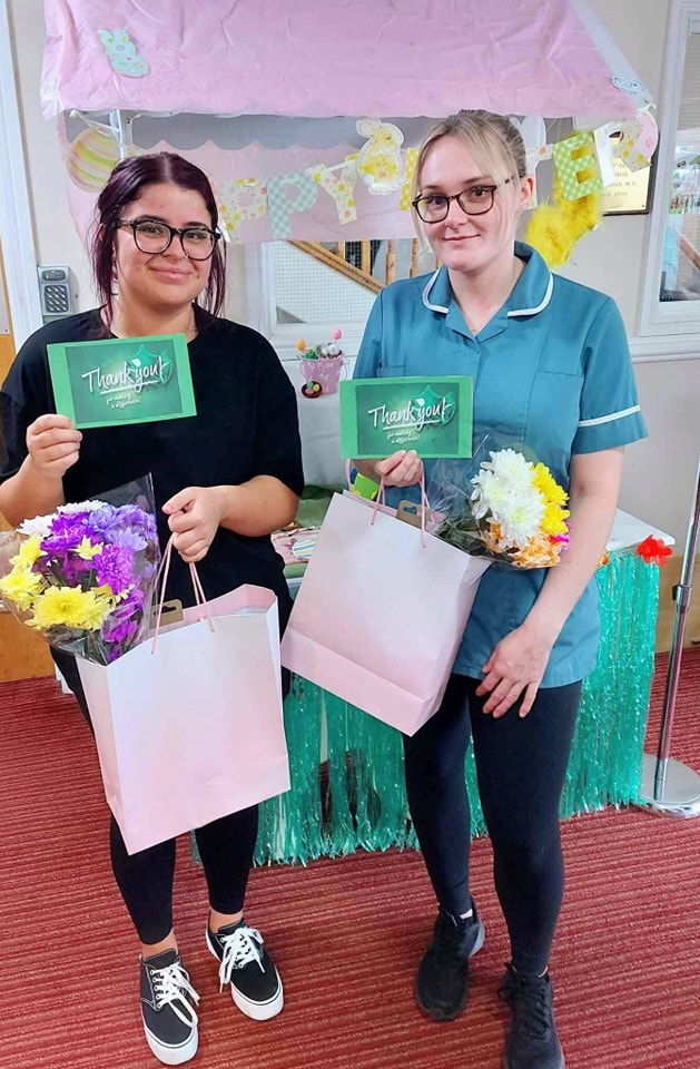 colleagues with flowers