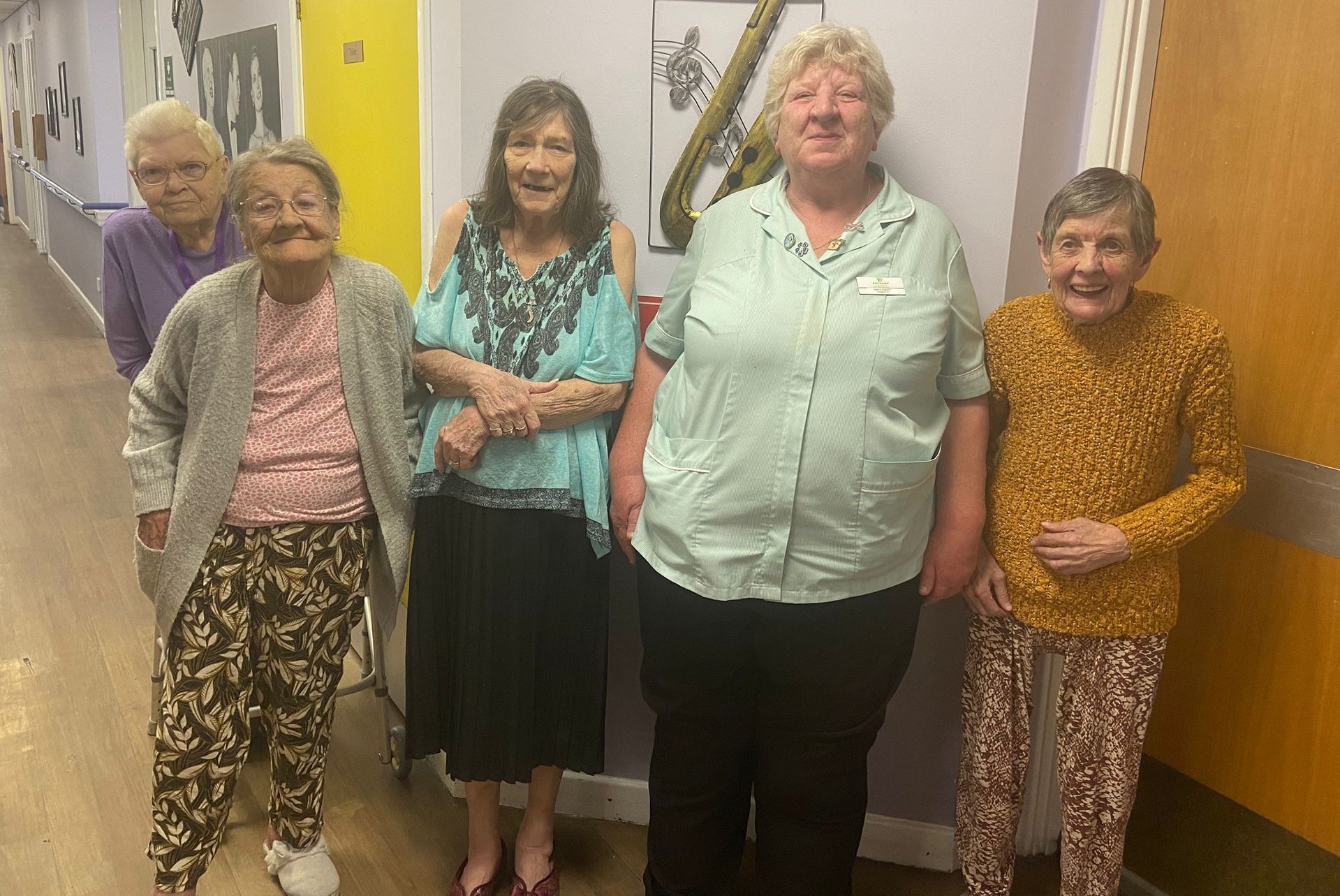 Gwen smiling with residents