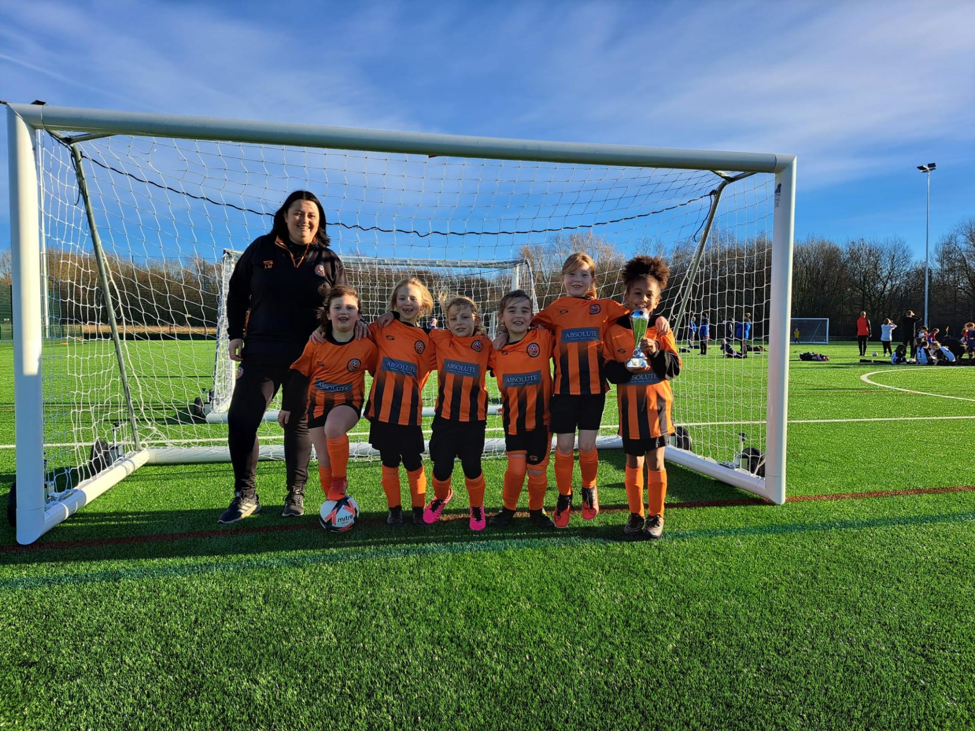Photo of Lisa-Marie coaching her local football team