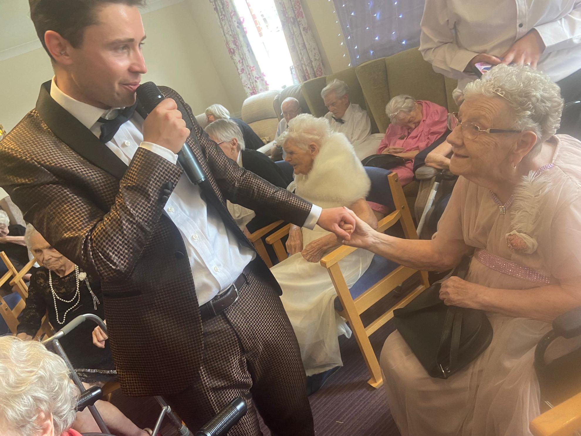 Alex Hall, local singer, performing at Lansbury Court Care Home in Sunderland