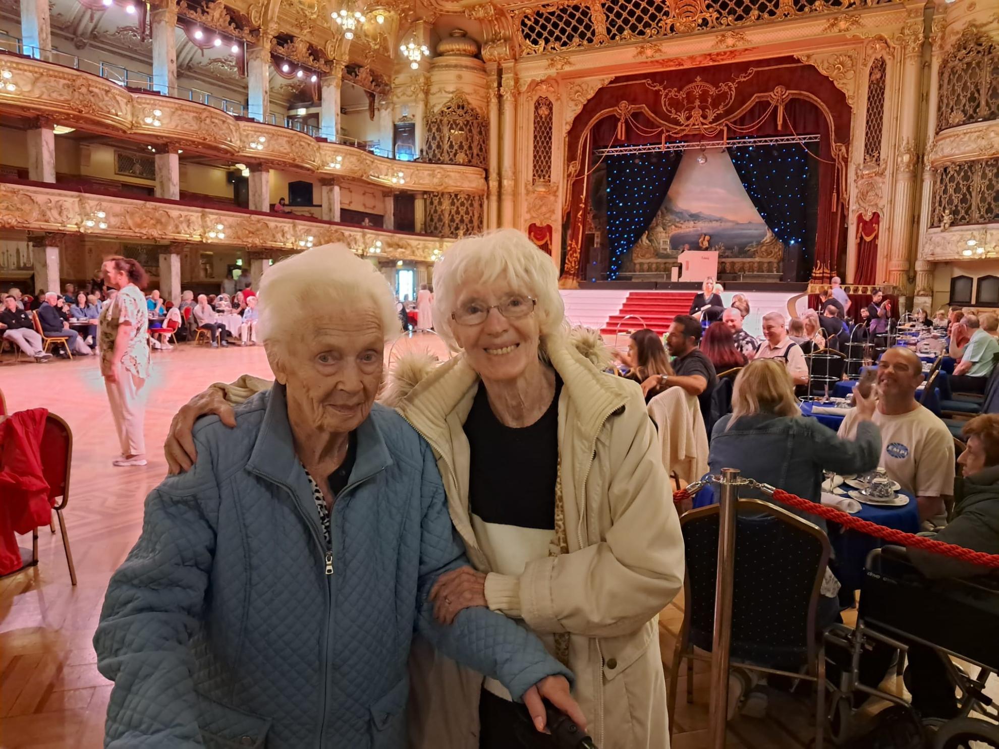 photo of friends at a ballroom