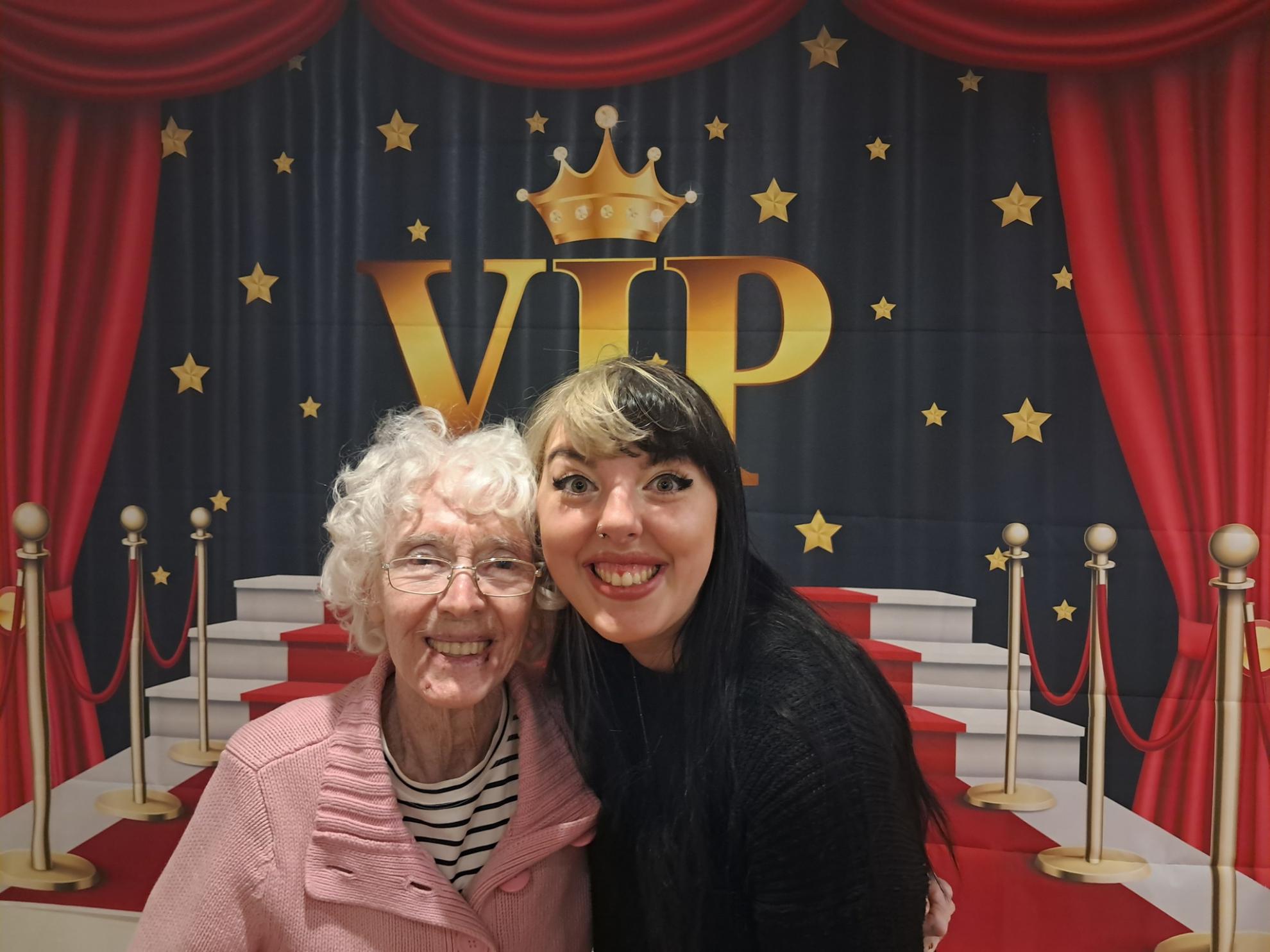 gran and granddaughter smiling 