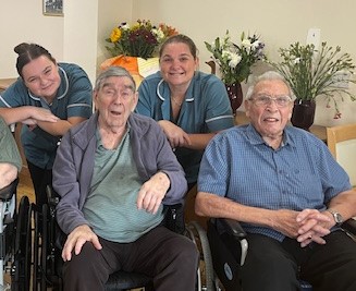photo of staff with residents 