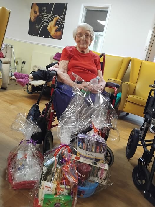 resident with her raffle wins 