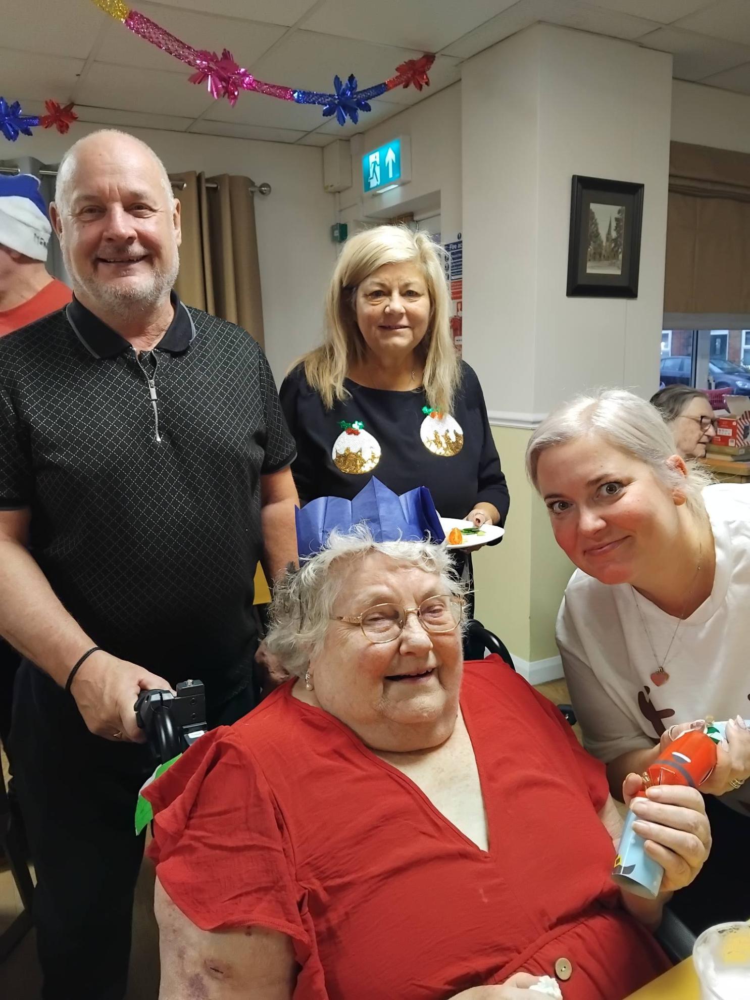 resident with family, enjoying the party