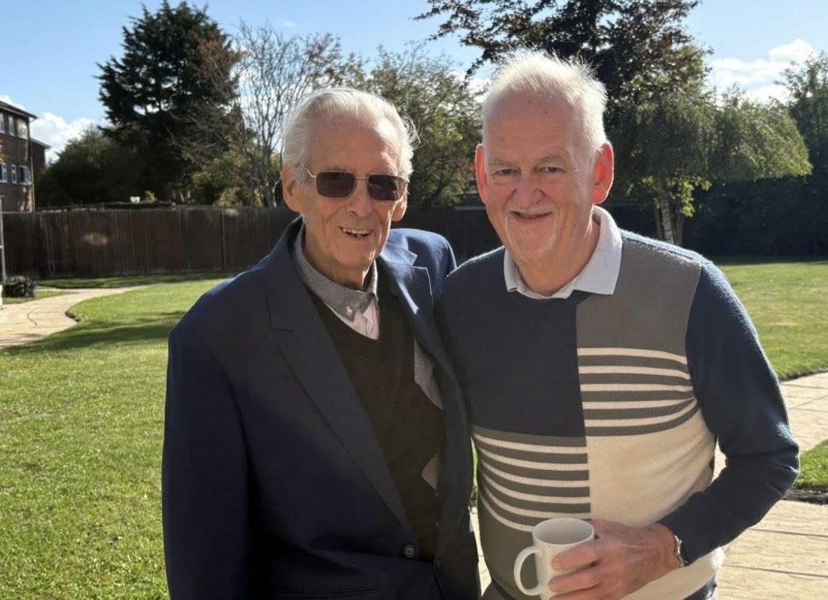Photo of Michael and friend smiling together