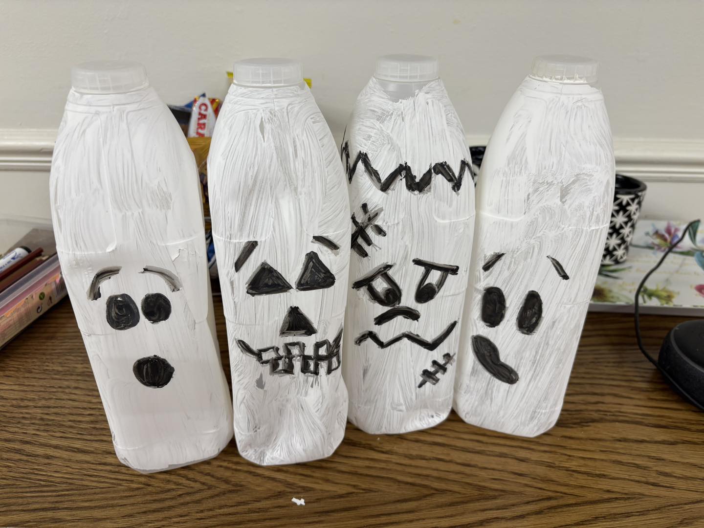 Photo of recycled milk bottles used for Halloween decor