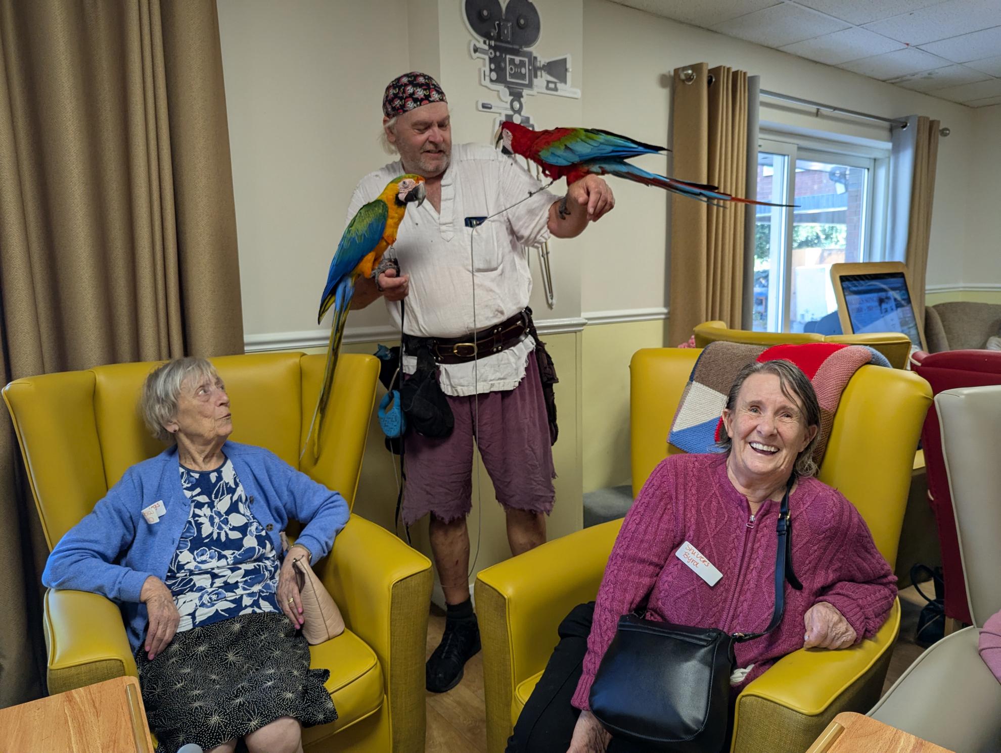 Residents at Chatsworth Lodge Care Home with parrots