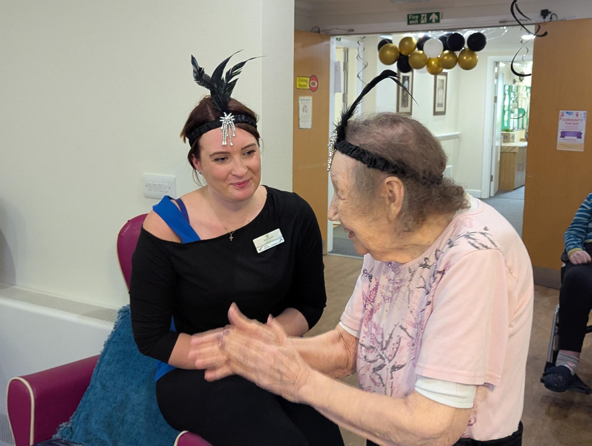 Photo of Activities Coordinator Jayne with resident Vera