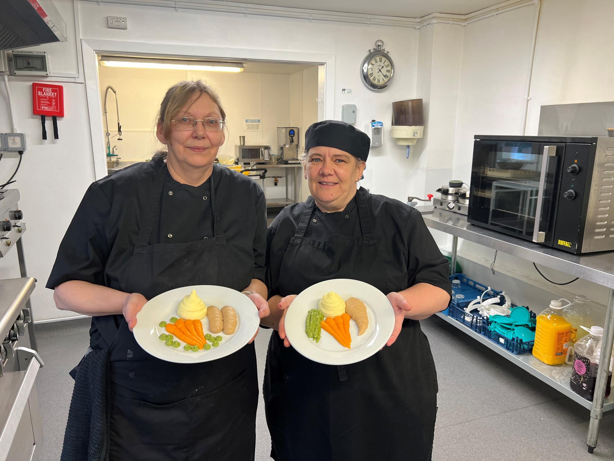 Catering team with specially prepped food