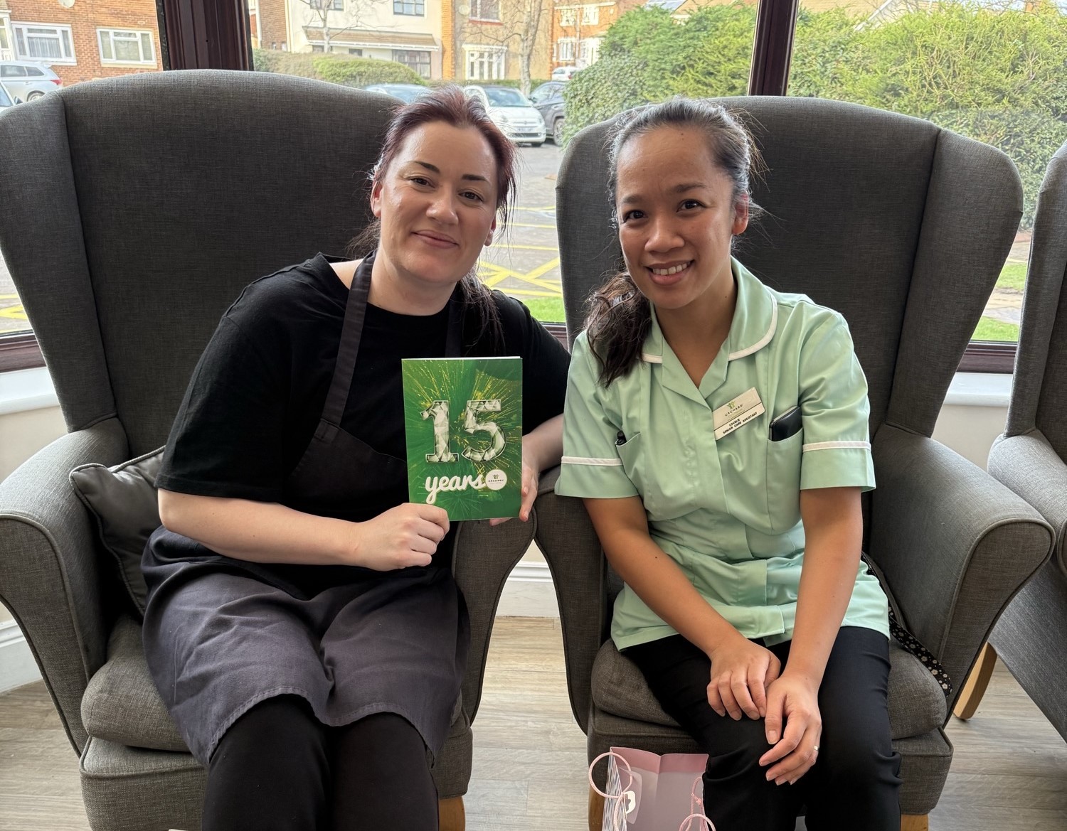 Stacy and carer Lovelie celebrating together