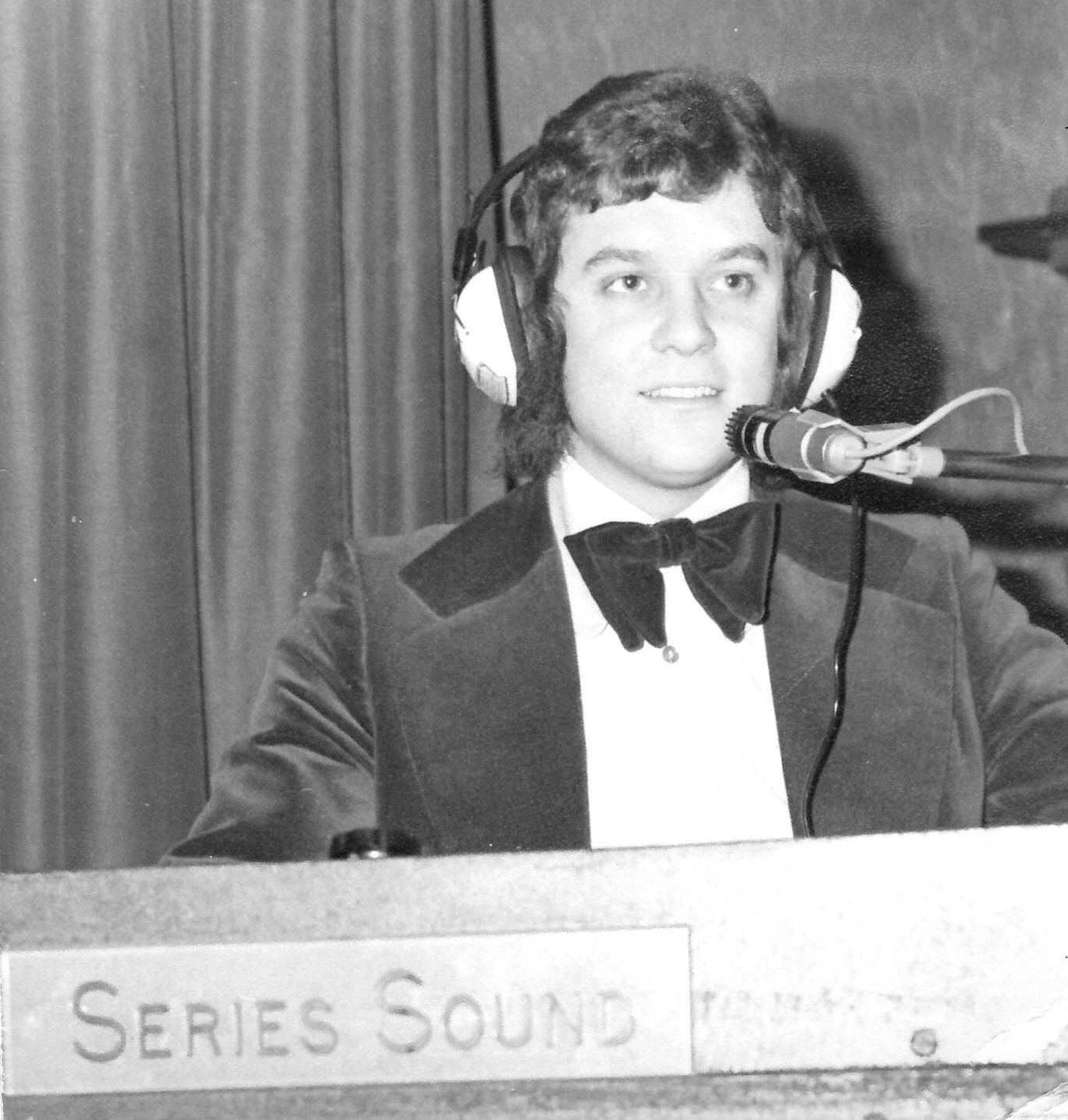 Photo of Terence on the DJ decks (black and white)