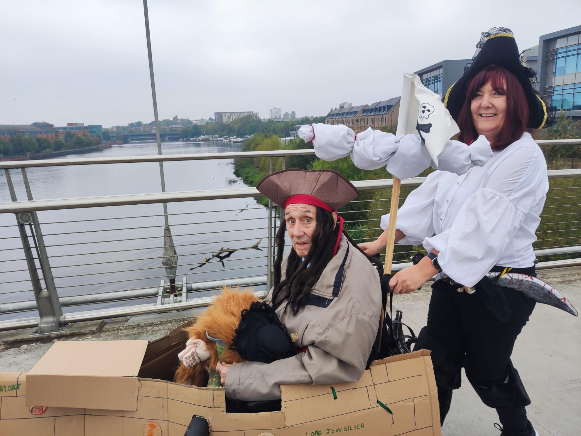 Clair and John Dressed up as pirates on Bridge