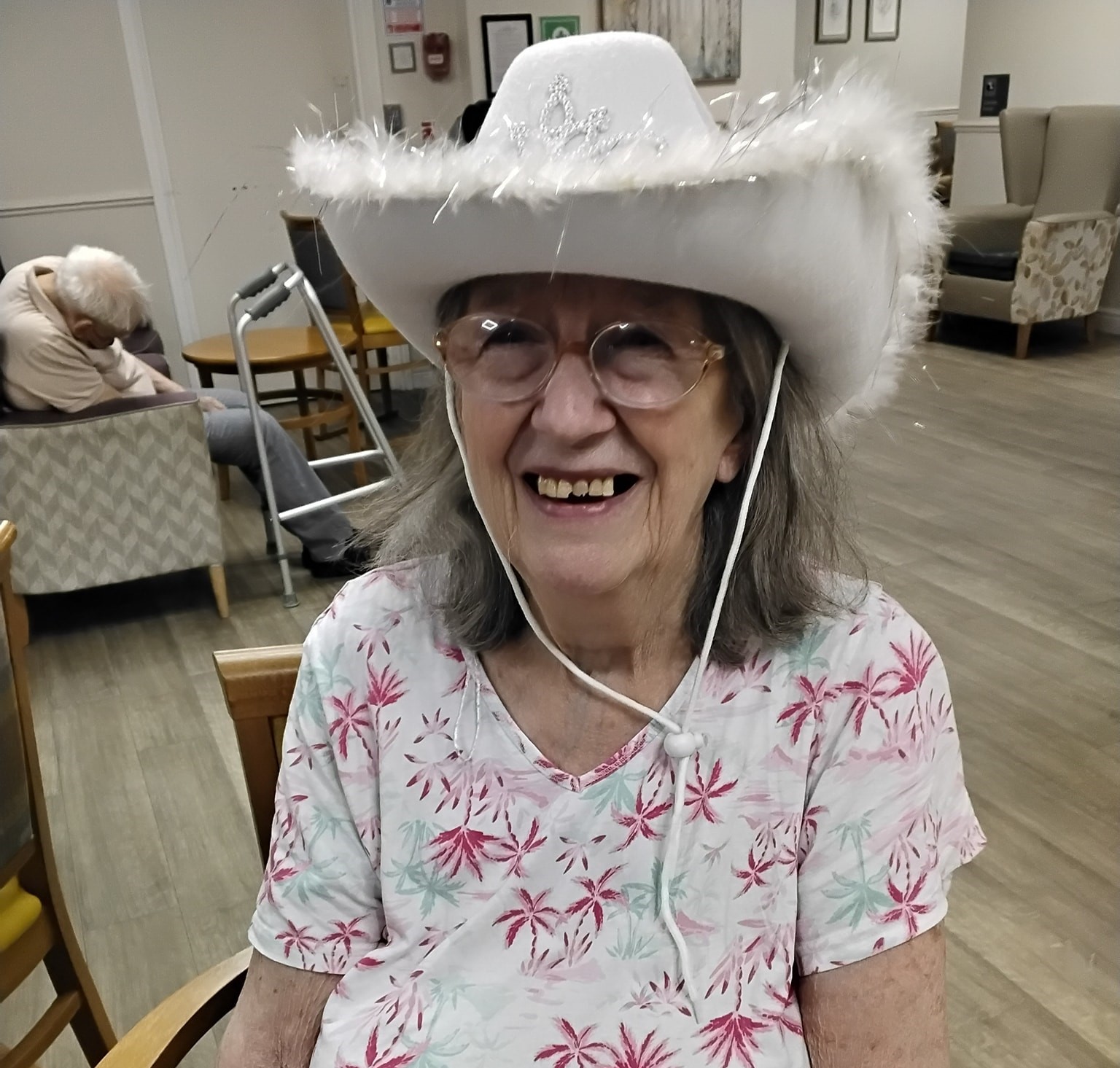 Photo of resident enjoying Dolly Parton entertainment at Riverdale