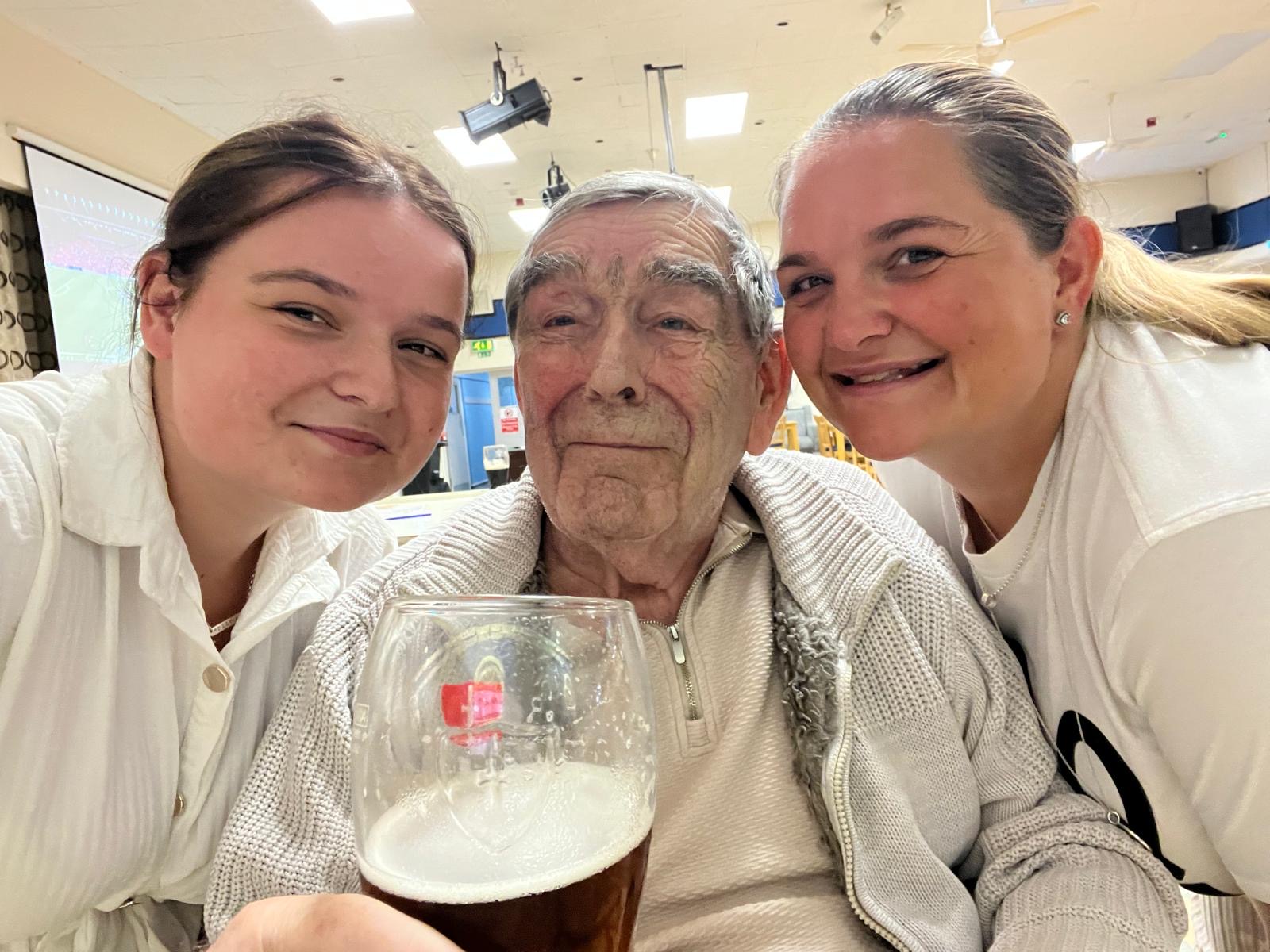photo of duo with resident smiling