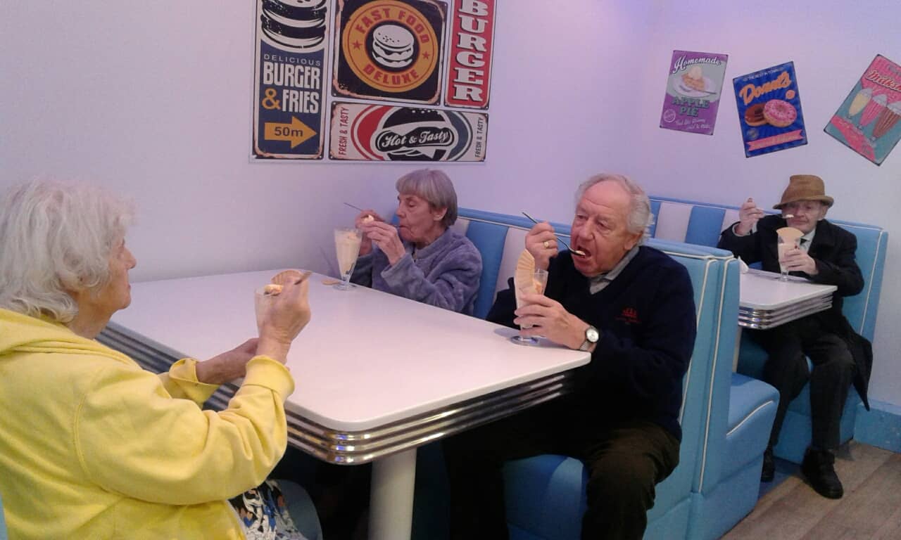 Residents at Lansbury Court in their American Diner.