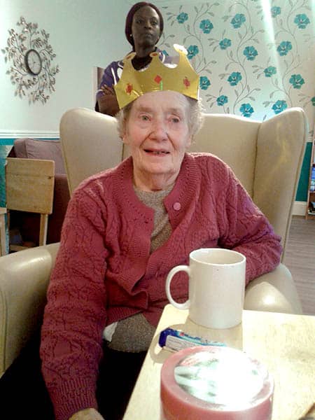Aurdrey wearing her crown on her 90th birthday.