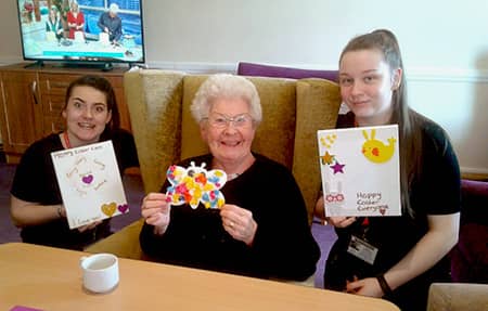 Residents and students showing off their crafts.