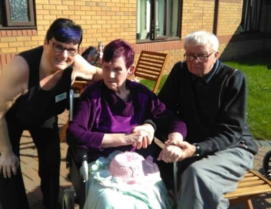 Residents enjoying the dementia friendly garden