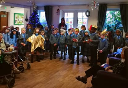 School children performing the Nativity for residents at Eaton Court