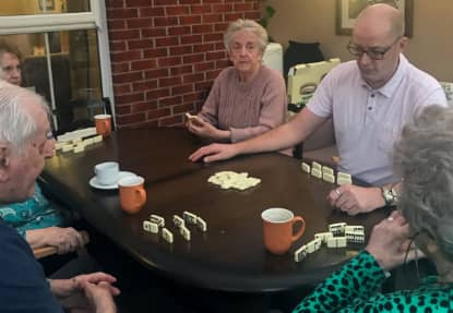 Residents enjoying a game of dominoes 