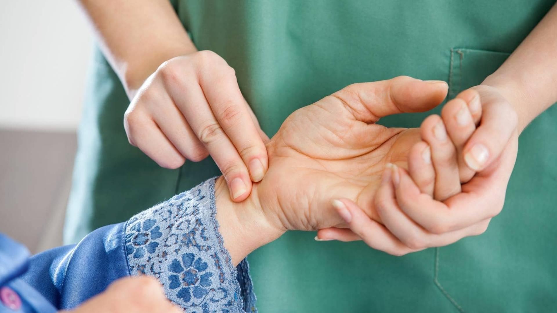 Nurse Taking Pulse