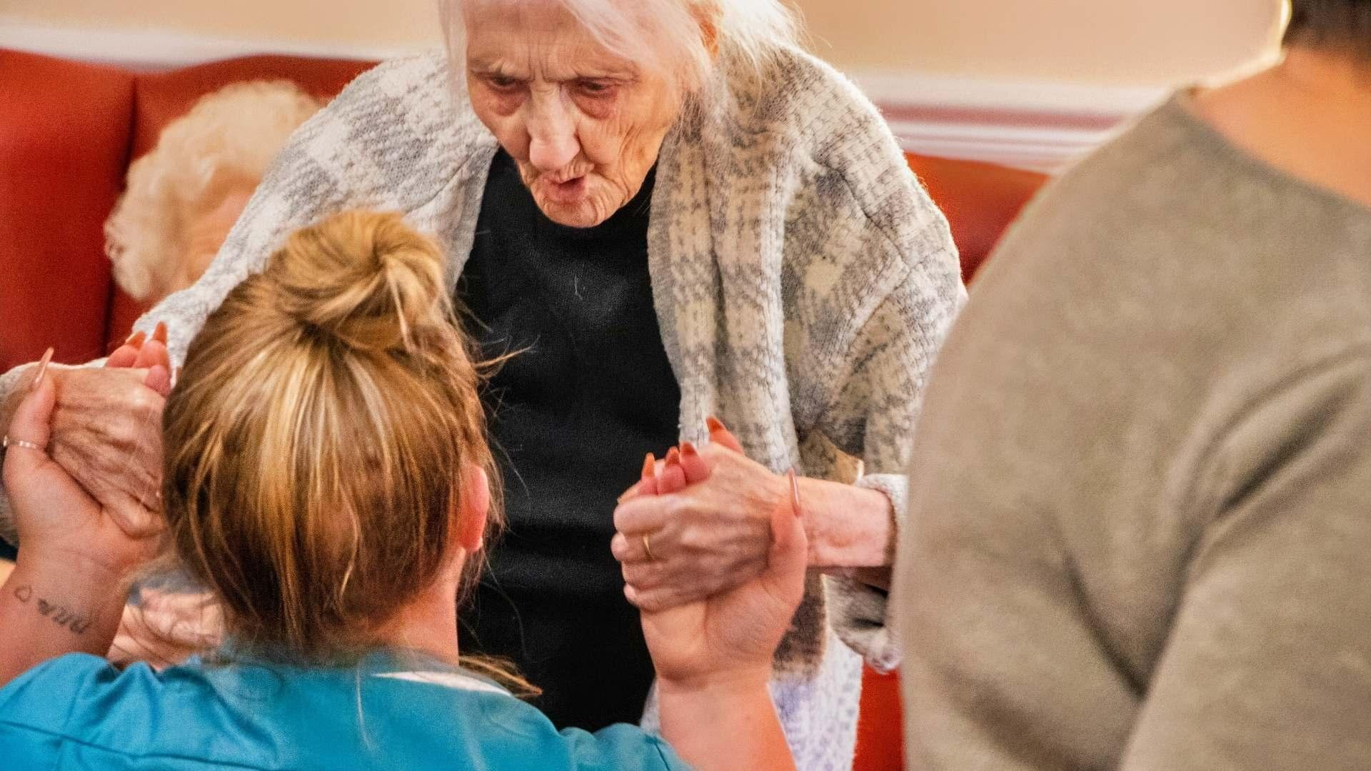dementia resident with carer