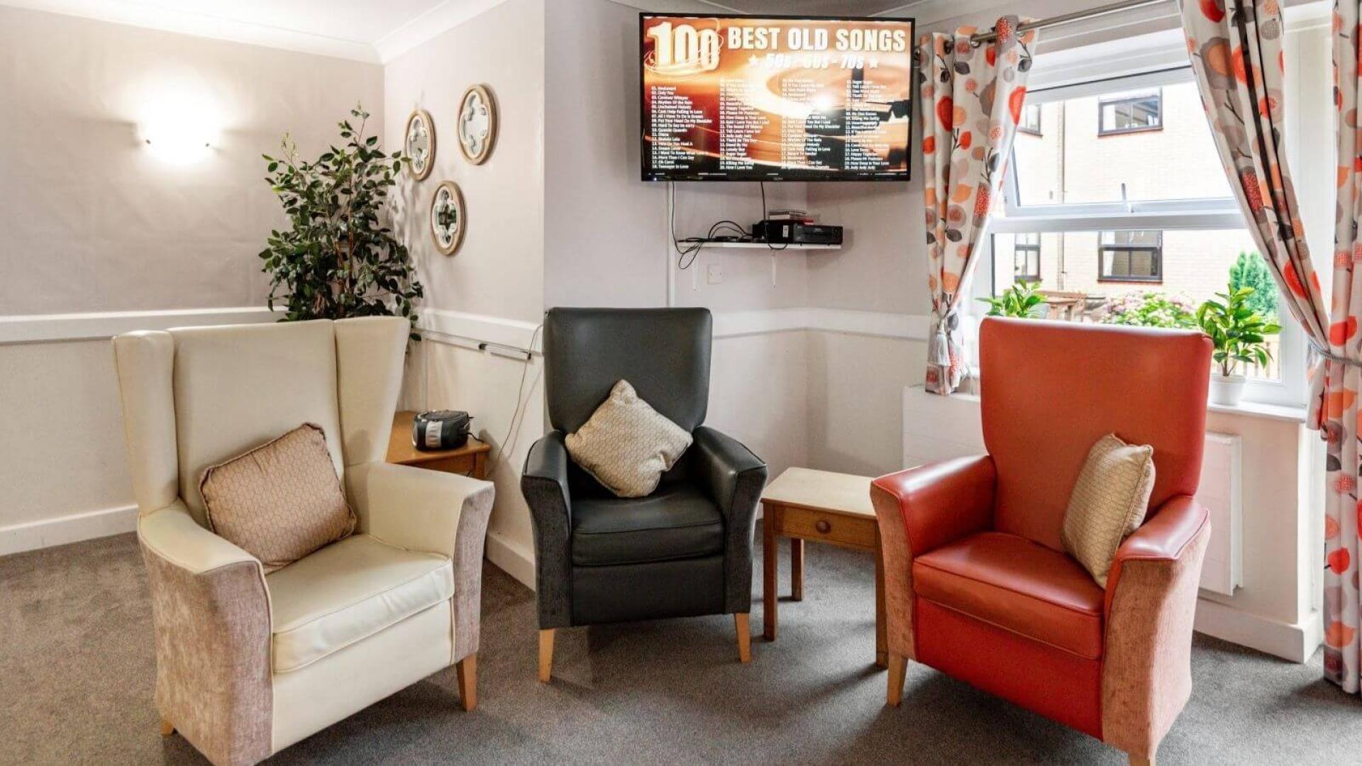 Cosy living room at Langfield Care Home in Middleton