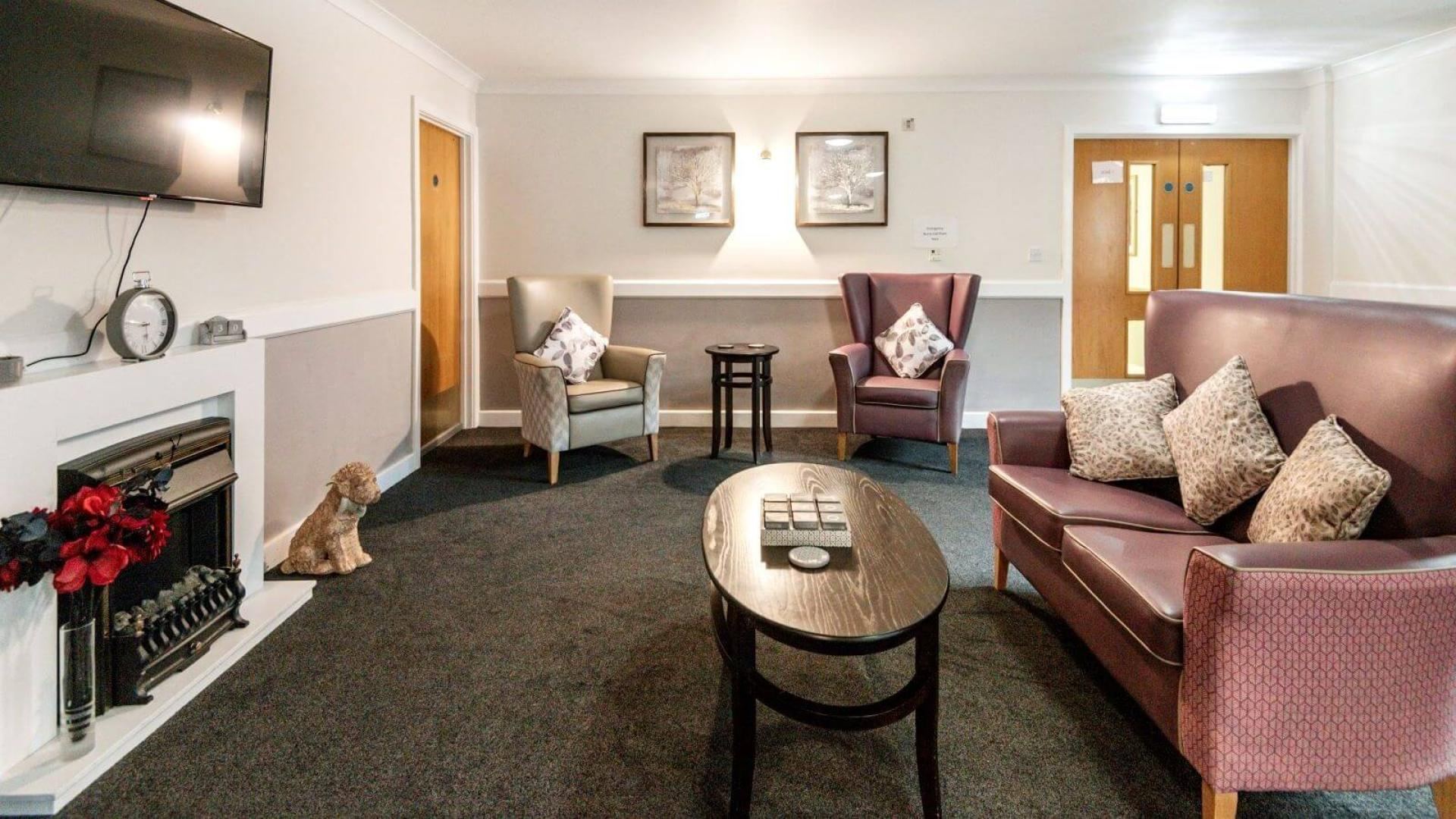 Spacious living room at Langfield Care Home in Manchester 