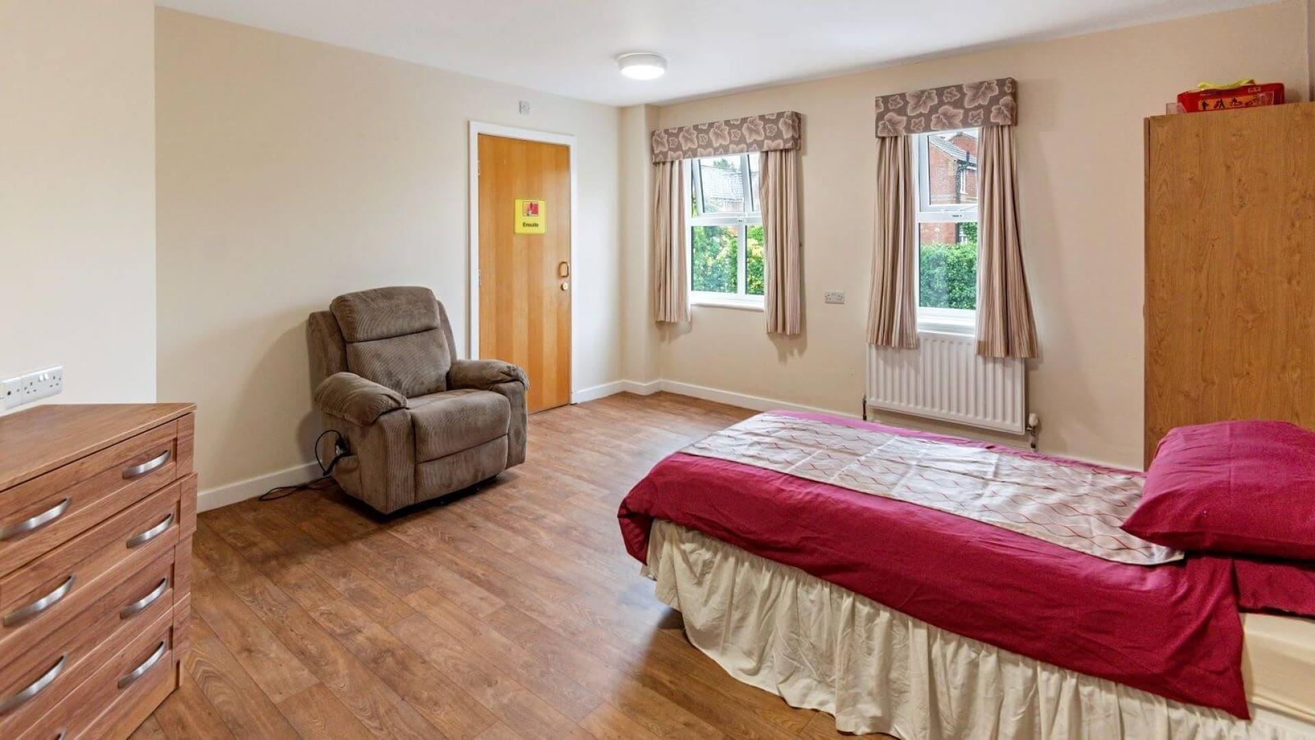 Large bedroom at Langfield Care Home in Manchester 