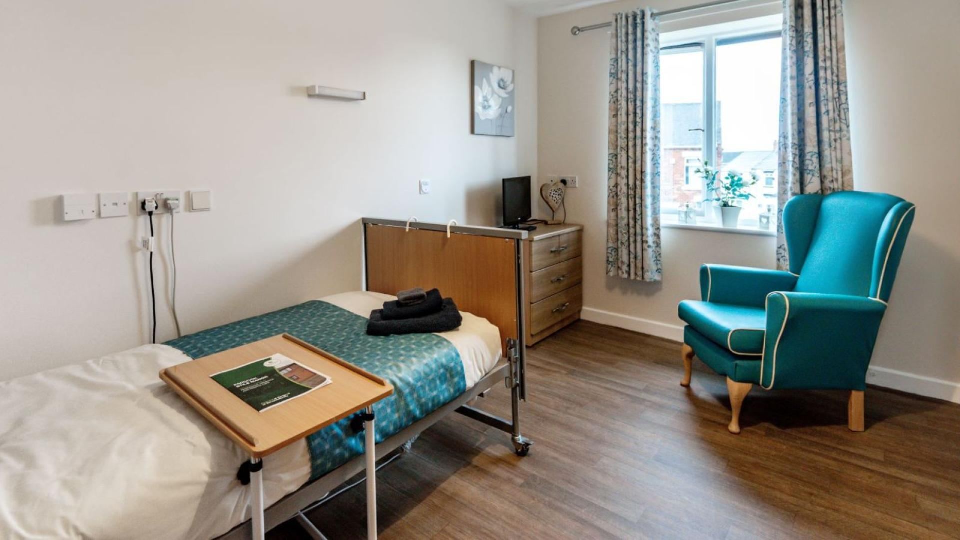 Spacious bedroom at Paddock Stile Manor Dementia Care Home in Houghton-le-Spring