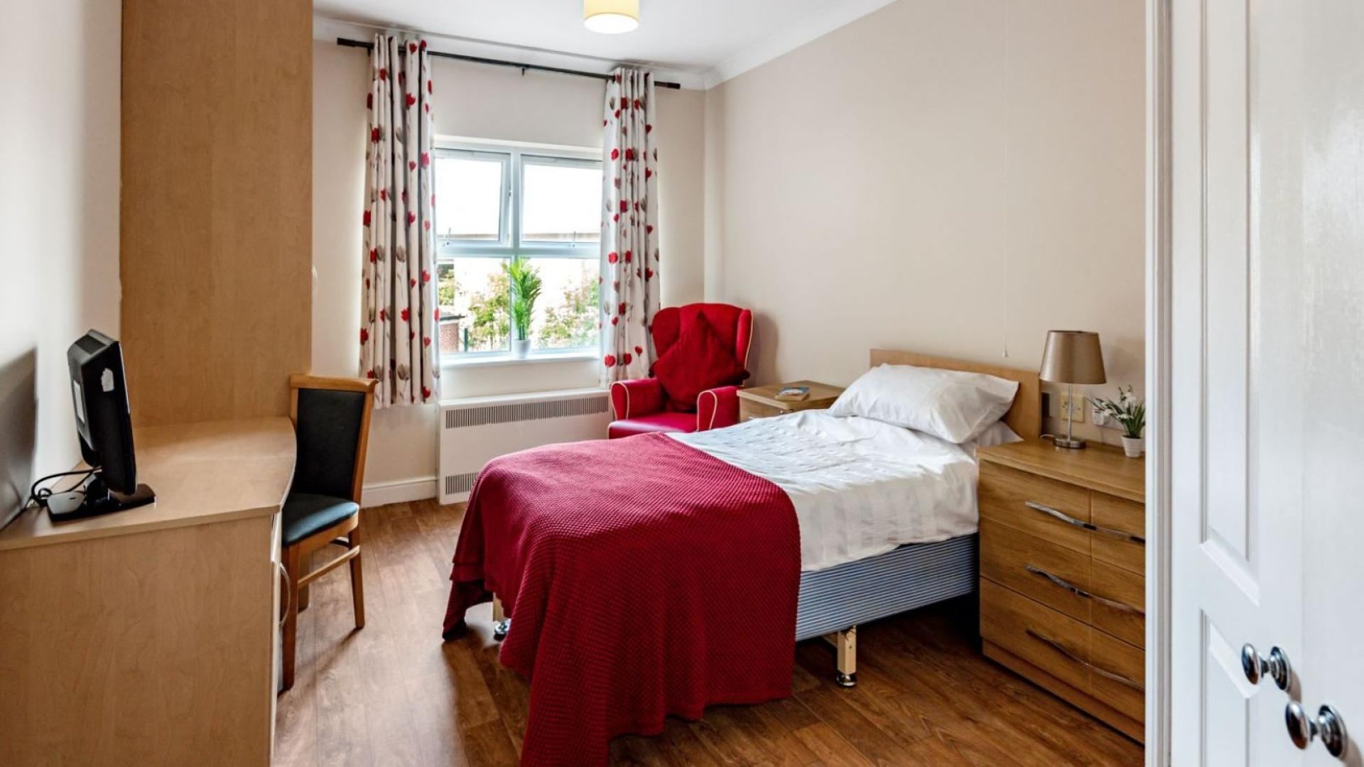 Spacious bedroom at Nesfield Lodge Dementia Care Home in Leeds