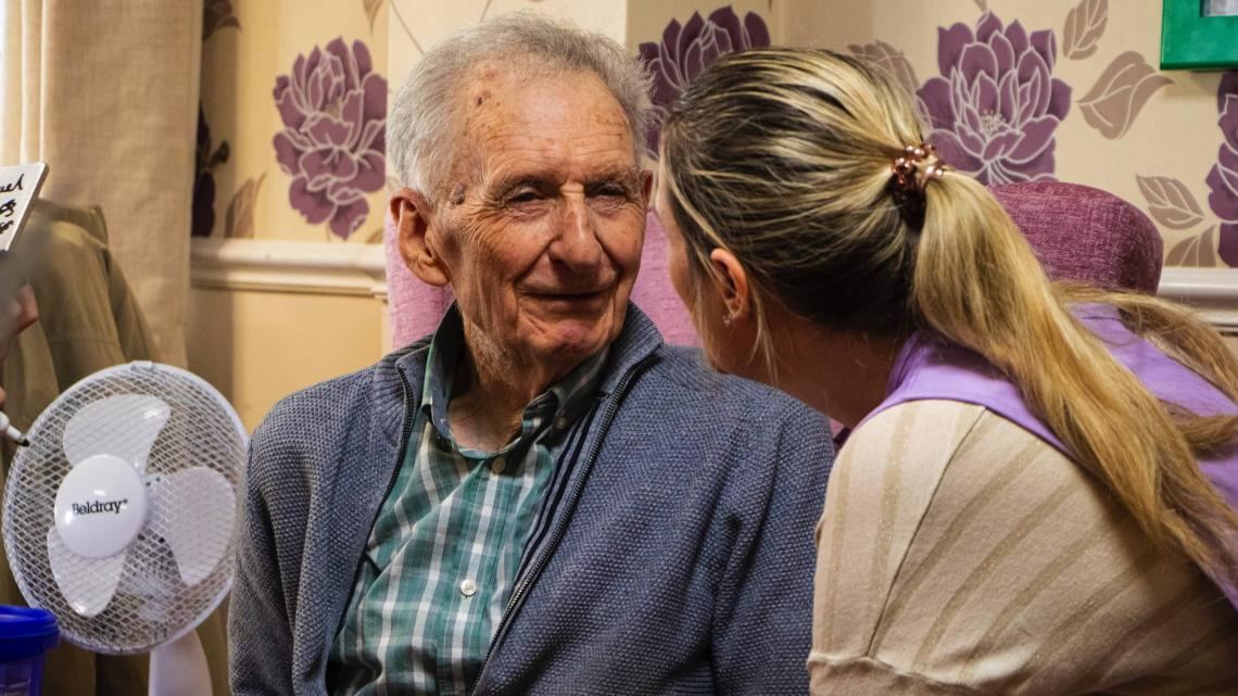 resident-carer-talking