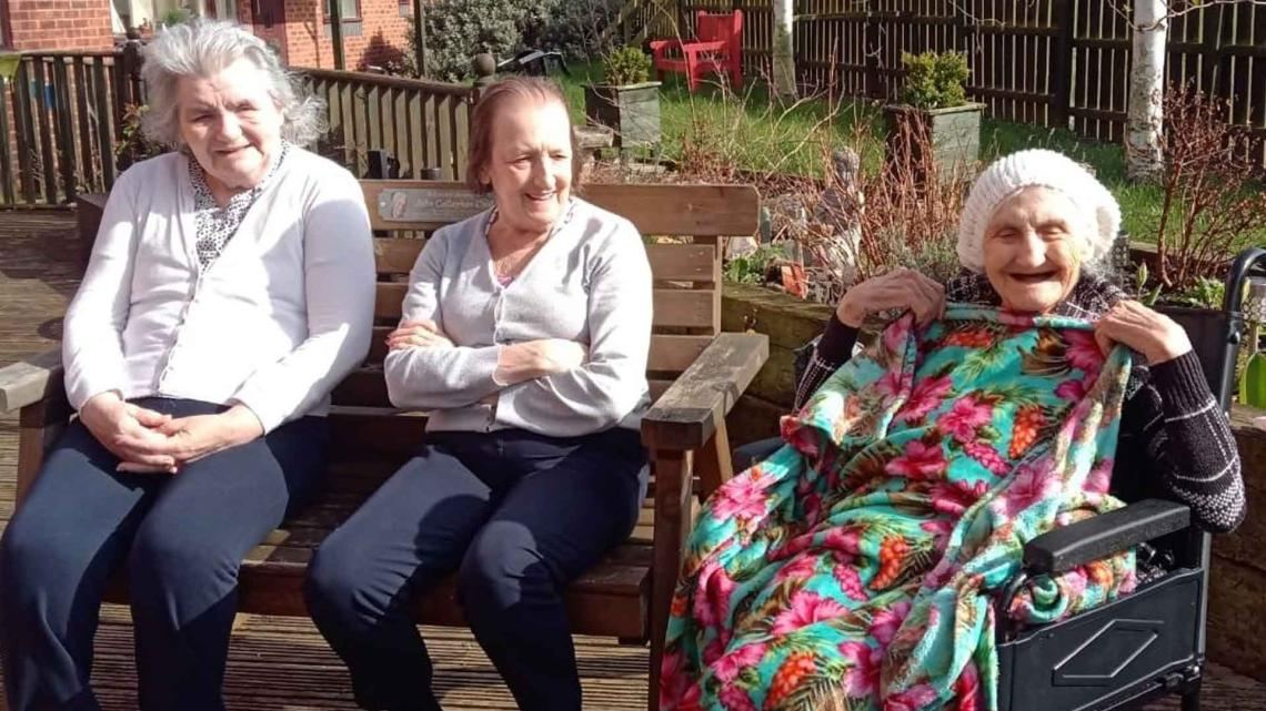 residents enjoy the sun