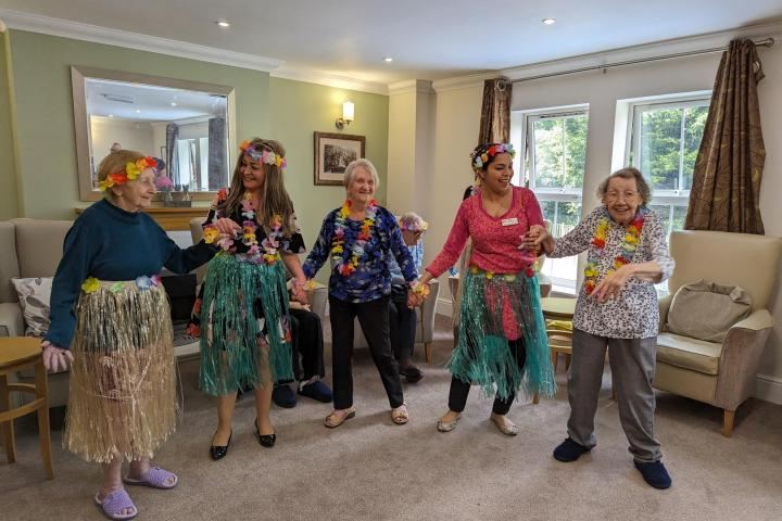 Team dancing at Penwortham Grange and Lodge Care Home in Preston 