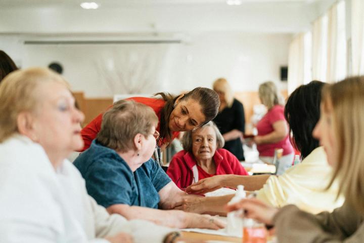 Carer with residents 