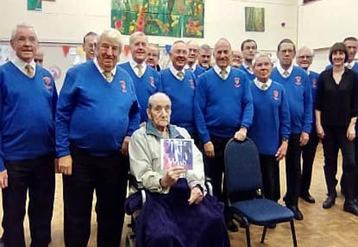Tom posing for a photo with the Castleford Male Voice Choir