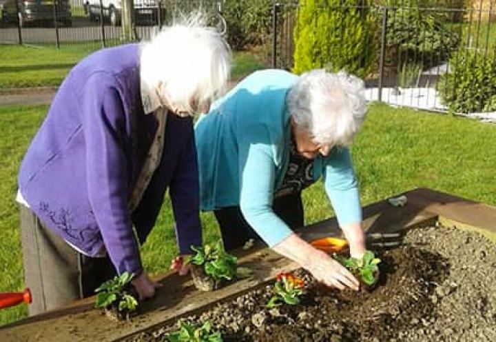 Residents Betty and Doreen enjoying a spot gardening.
