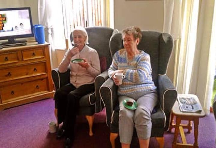 Residents at Archers Park enjoying some coffee and cake.