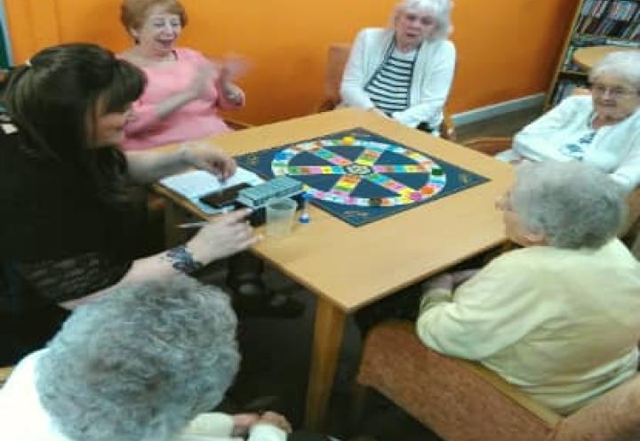 Residents playing trivial pursuit 