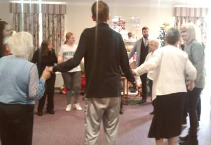 residents dancing to the music. 
