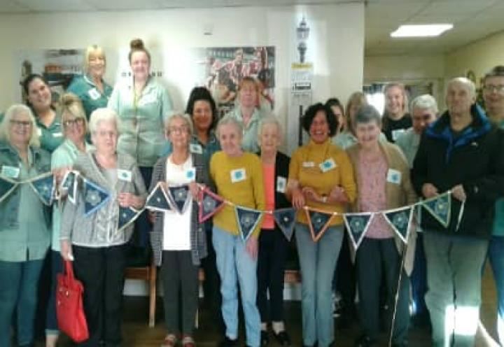 residents and staff ready for denim for dementia. 