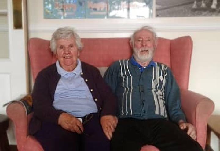Gordon and Margaret sitting together. 