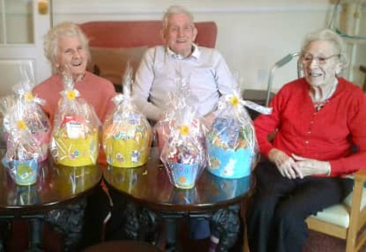resident showing off their easter baskets. 