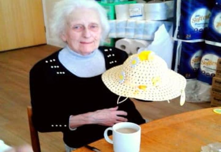 resident with her easter bonnet. 