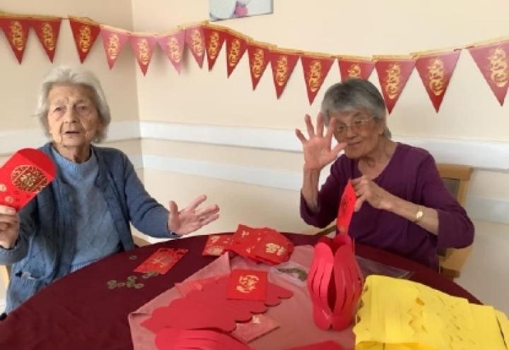 Residents taking part in arts and crafts. 