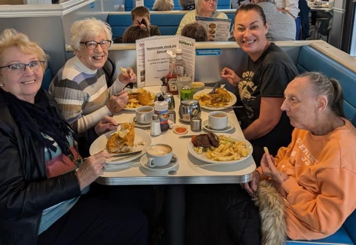 Ladies enjoy their fish and chips