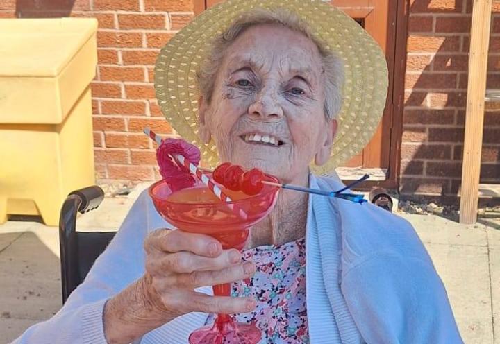 Lady enjoying a cocktail